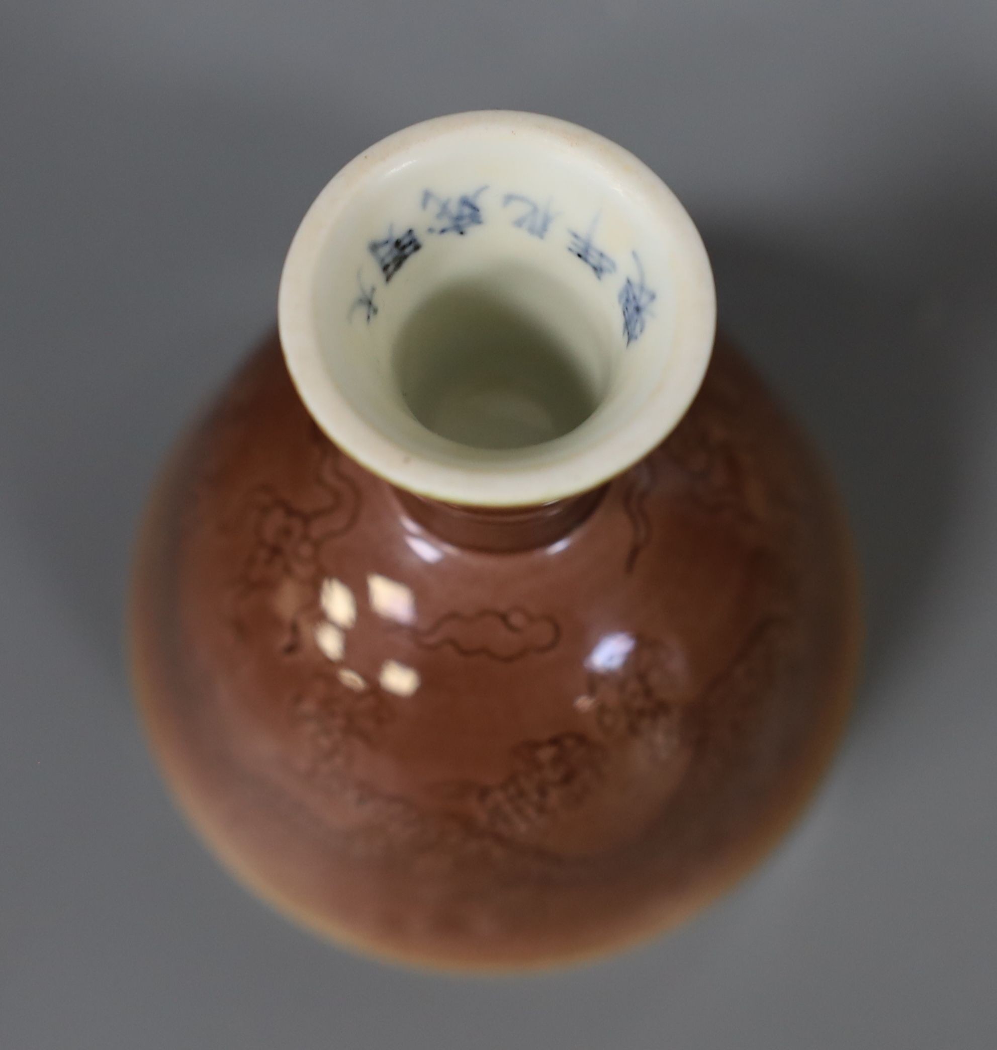 A Chinese cafe au lait glazed saucer, three bowls and a stem cup